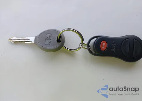 2004 Jeep Grand Cherokee Limited z USA, uszkodzony, nr VIN 1J4GW58N34C383411